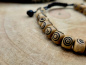 Preview: Knochen Mala-Armband mit eingraviertem Muster | braun