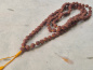 Preview: Rudraksha-Mala mit 108 einzeln geknoteten Samen · Dharmapala