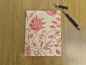 Preview: Handgefertigtes Lokta-Notizbuch mit rotem Blumenmuster aus Nepal