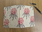 Preview: Handgefertigtes Lokta-Notizbuch mit Rhododendron-Motiv aus Nepal
