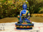 Preview: Handbemalte Medizin-Buddha-Statue aus blauem Resin auf verziertem Lotossockel, gefertigt in Nepal