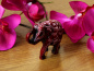 Preview: Kleiner Elefant aus Resin mit geschnitztem Design