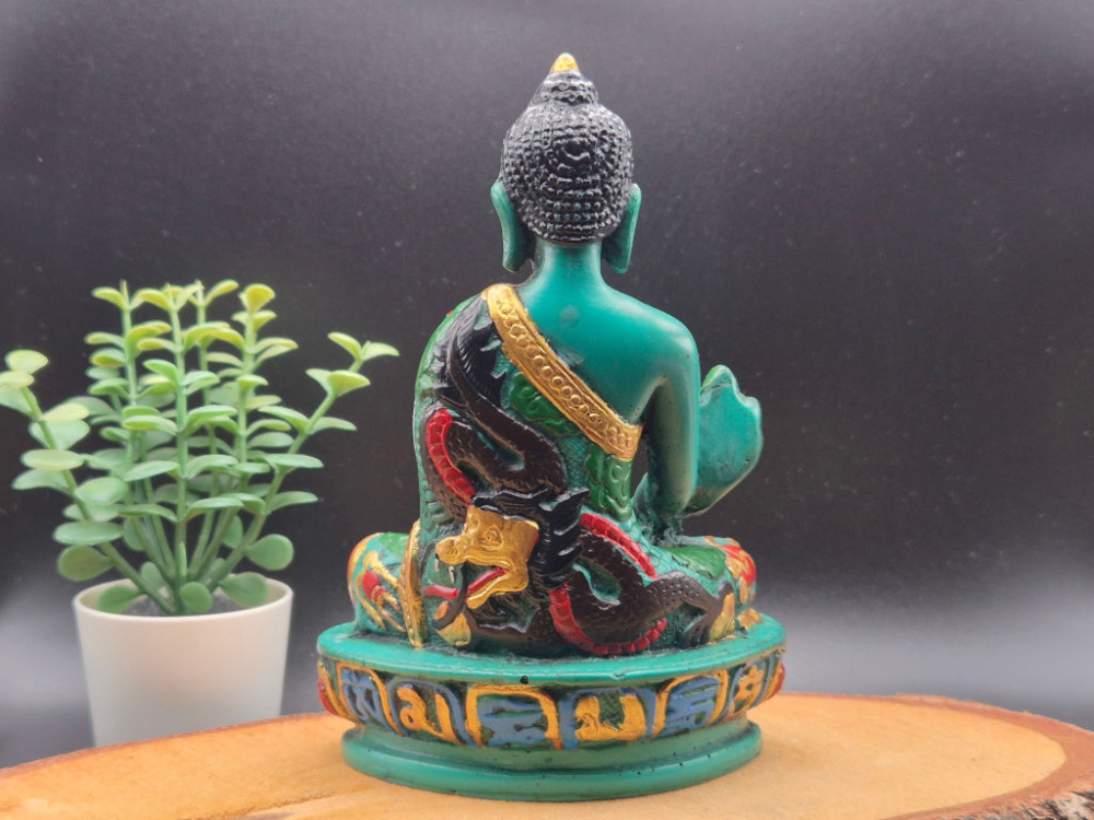 Handbemalte Medizin Buddha Statue aus Resin aus Nepal mit Heilpflanze und Almosenschale