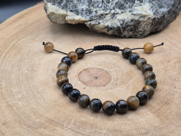 Handgefertigtes Armband aus Tigerfalkenauge mit goldbraunen und blaugrauen Schattierungen, gefertigt in Nepal